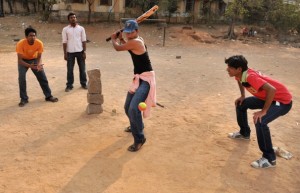 Indian youths play street cricket, locally known as "gully", in Hyderabad on February 18, 2011. The 2011 Cricket World Cup takes place in India, Sri Lanka and Bangladesh from February 19-April 2 with 14 nations taking part in the marathon six-week tournament. AFP PHOTO / Noah SEELAM (Photo credit should read NOAH SEELAM/AFP/Getty Images)