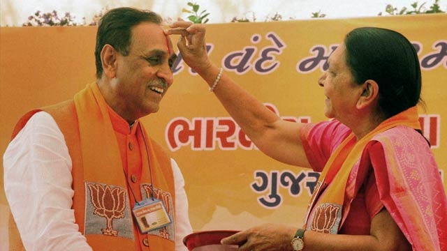 Nitin Patel out of Gujarat CM race,Vijay Rupani holds it.