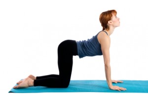 Woman Practices Yoga