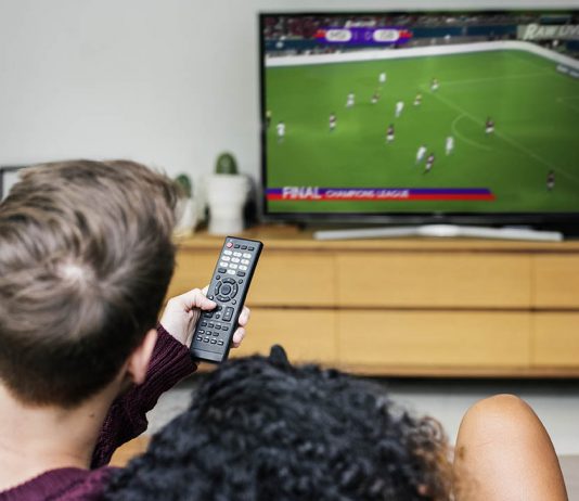 Live Football on Today Lets not miss any games anymore couple watching a football game on tv